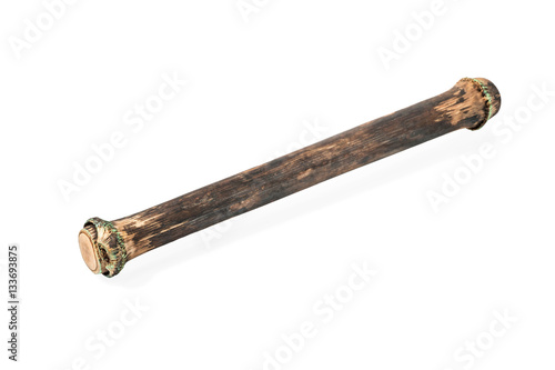 Wooden rainstick filled with pebbles and grains to make a sound similar to rain, isolated on white background
