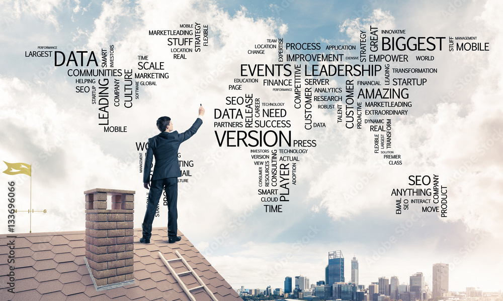 Businessman on brick roof draw world map as concept of globaliza Businessman on brick roof draw world map as concept of globaliza