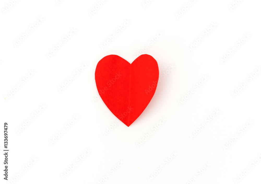 Red paper origami heart  on white background .