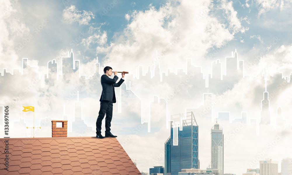 Engineer man standing on roof and looking in spyglass. Mixed med Engineer man standing on roof and looking in spyglass. Mixed med