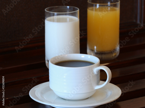 coffee, orange juice and milk for breakfast.