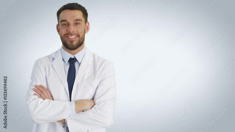 Mid SHot of a Smiling Scientist Crossing Hads on a Chest. Shot on White Background. Shot on RED Cinema Camera 4K (UHD). Mid SHot of a Smiling Scientist Crossing Hads on a Chest. Shot on White Background. Shot on RED Cinema Camera 4K (UHD).