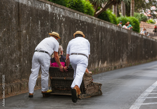 Obraz na płótnie Toboggan riders on sledge in Monte - Funchal Madeira Portugal