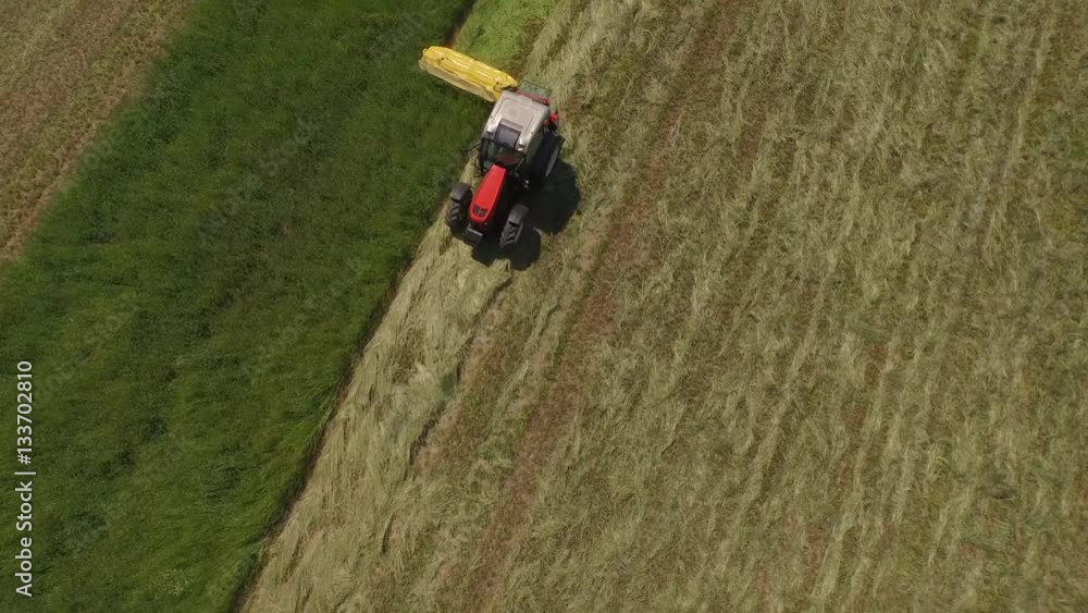 Aerial view of tractor on field Aerial view of tractor on field