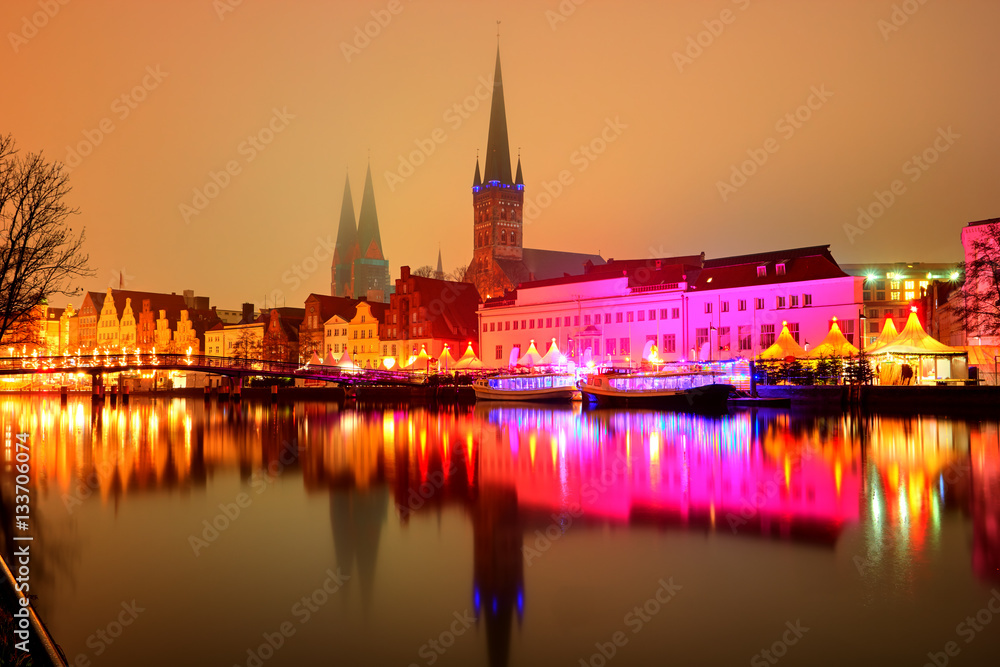 View of the pier architecture in Lubeck at night, Germany