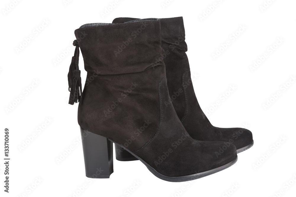 Black ankle boots with a tassel isolated on white Black ankle boots with a tassel isolated on white