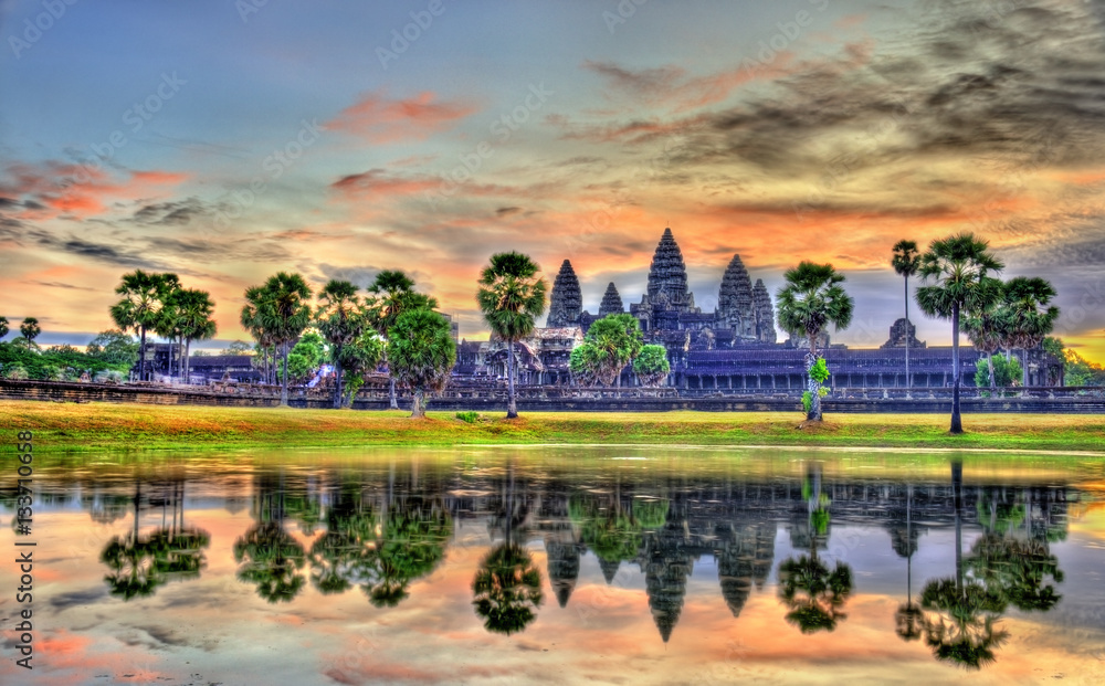 Naklejka premium Sunrise at Angkor Wat, a UNESCO world heritage site in Cambodia
