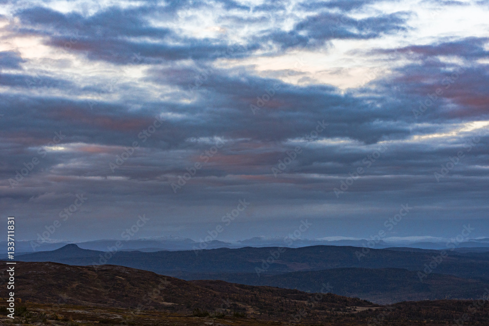 View over soft mountain tops at dawn 