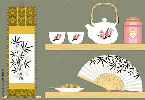 Oriental tea time with  teapot, cups, hanging scroll, sweets and fan