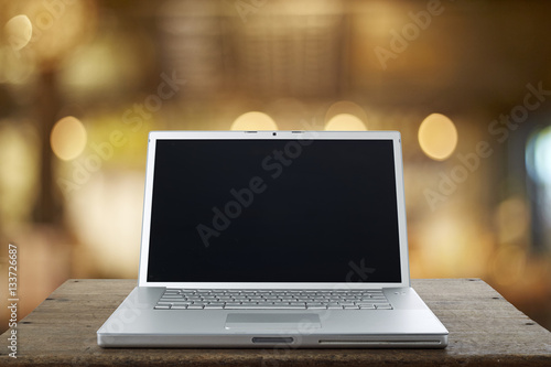 Aluminum Laptop on a wooden table