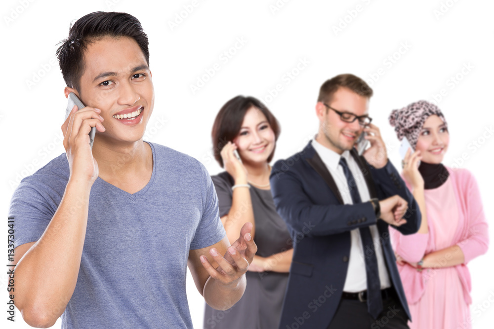 young handsome man using mobile phone to call young handsome man using mobile phone to call