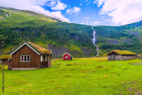 Typical house with grass on the roof in a mountain village. Norway