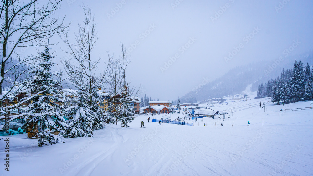 Skiing in a Winter Landscape to the Alpine Village of Sun Peaks in the Shuswap Highlands of central British Columbia, Canada