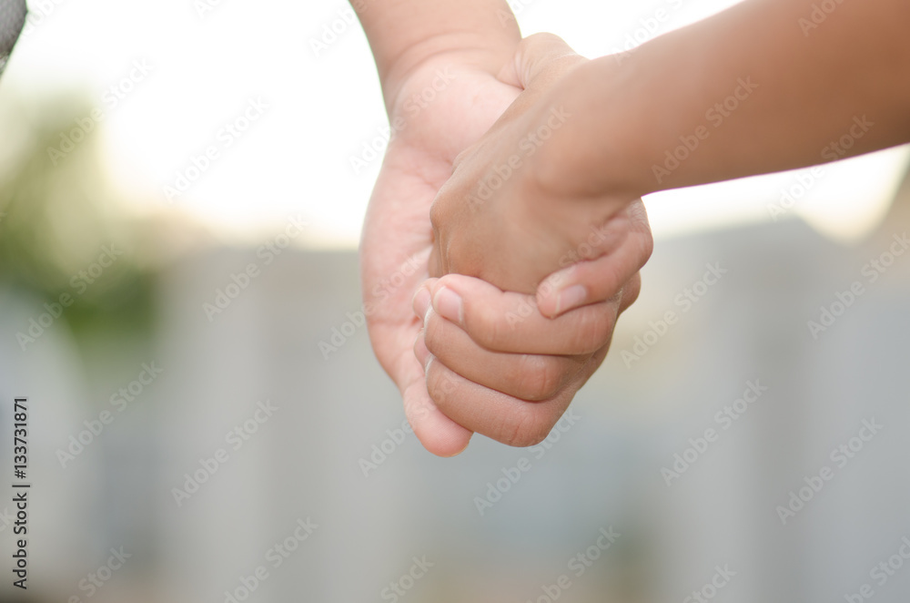 .Two little kids holding hands and holding hands walking. The me .Two little kids holding hands and holding hands walking. The me