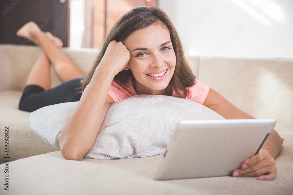 woman using tablet pc at home woman using tablet pc at home