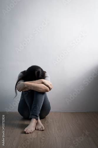 depression woman sit on floor