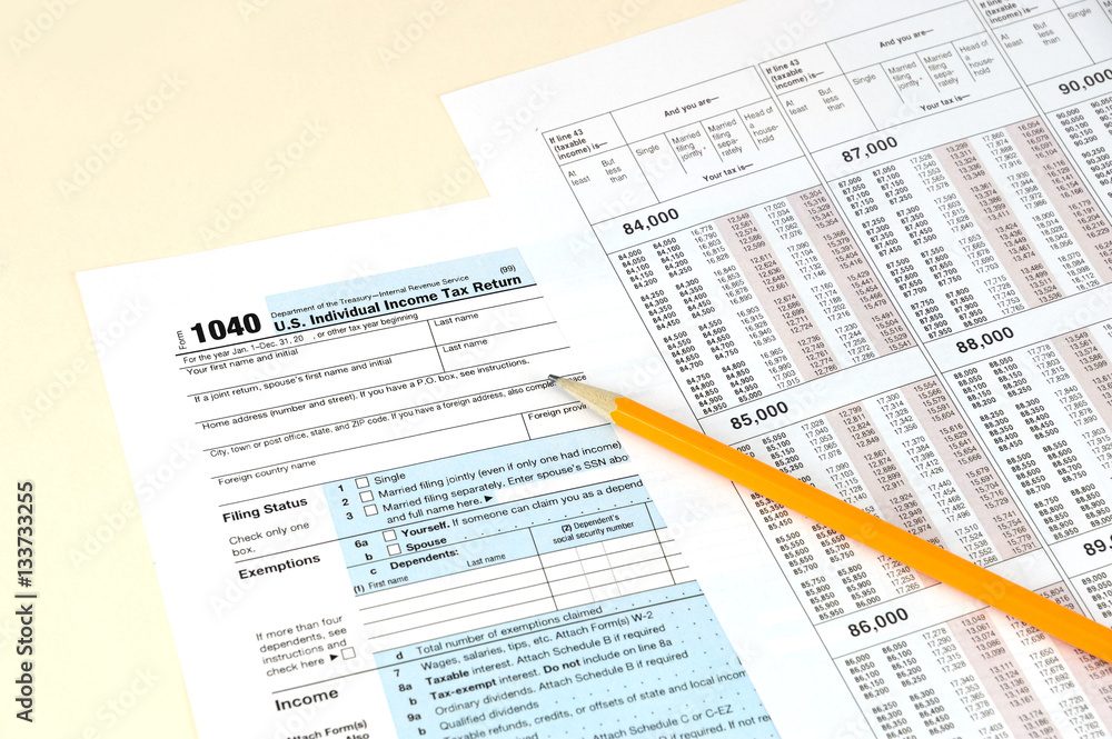 tax calculation form and pencil on the form tax calculation form and pencil on the form