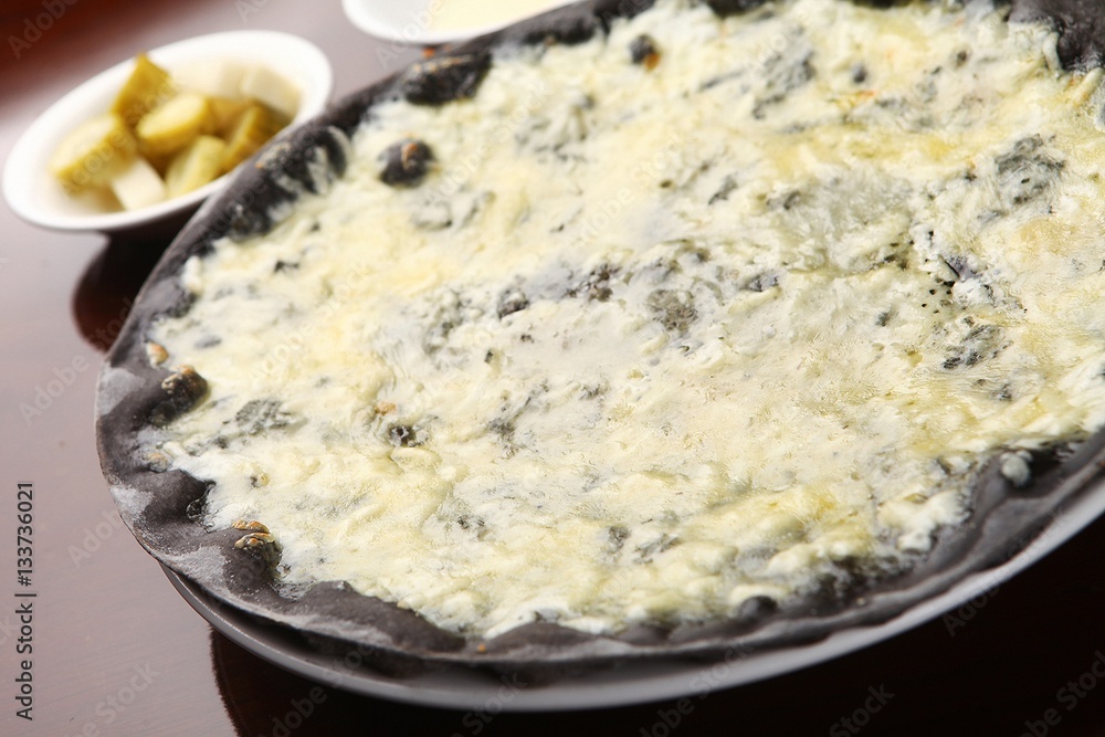 Gorgonzola pizza on table Gorgonzola pizza on table