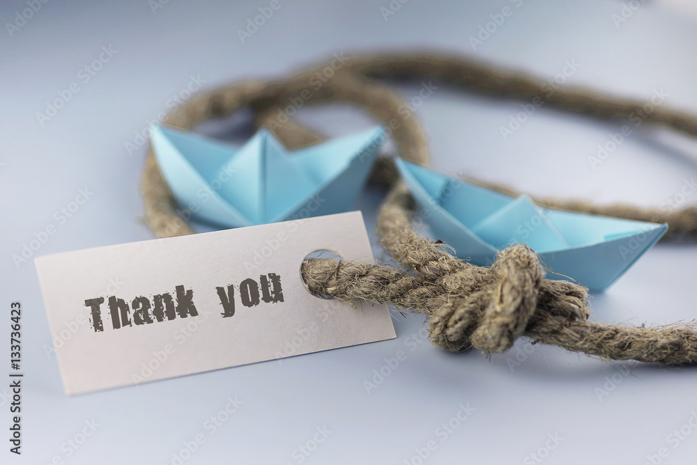 sticker with thank you thick braided rope and ship paper origami Stock ...