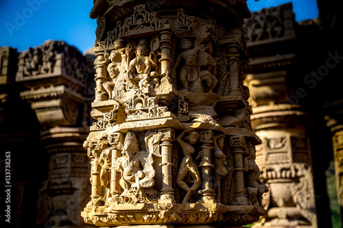 Obraz na plátně Sculpture of Hindu god goddess carved on sandstone pillars in cursed and haunted