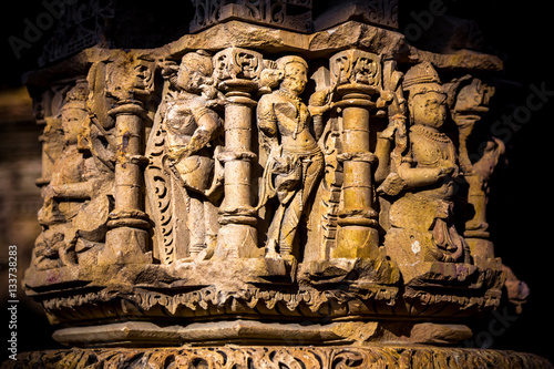 Slika na platnu Sculpture of Hindu god goddess carved on sandstone pillars in cursed and haunted