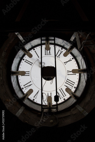 Old wall clock - mechanism inside, vertical