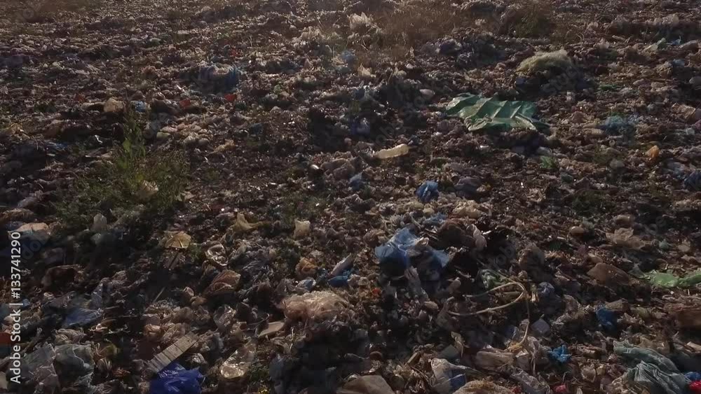 Aerial. Flying at low altitude over illegal garbage dump. Aerial. Flying at low altitude over illegal garbage dump.