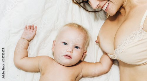 Mum feeds the child breast milk. Breastfeeding. The baby is very