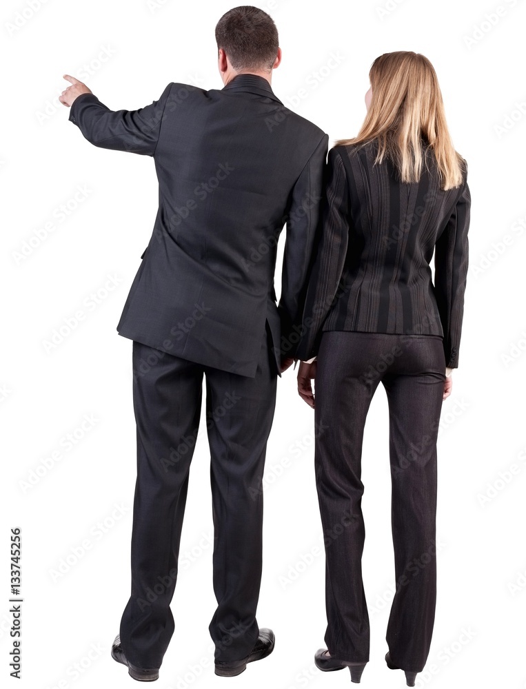 Back view of pointing business team. Back view of pointing business team.