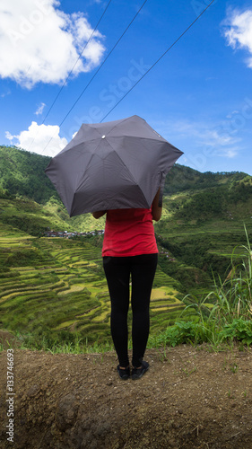 Girl Holding Umbrella For Shade at the Rice Terraces