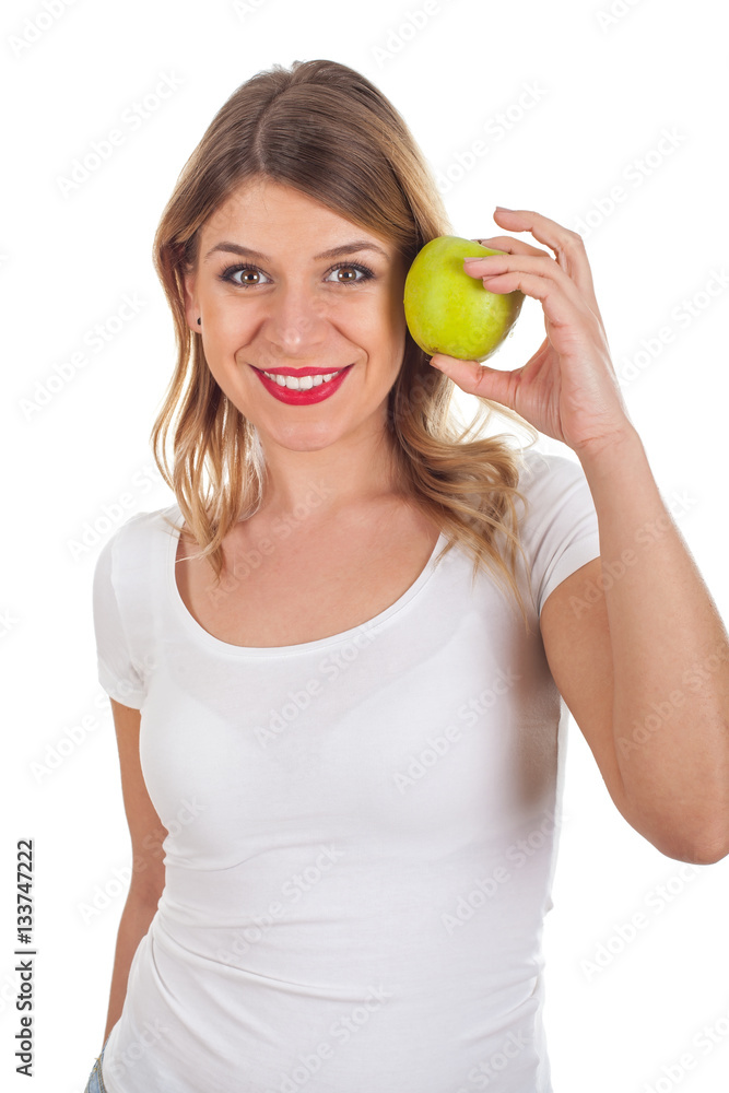 Smiling woman holding a green apple Smiling woman holding a green apple
