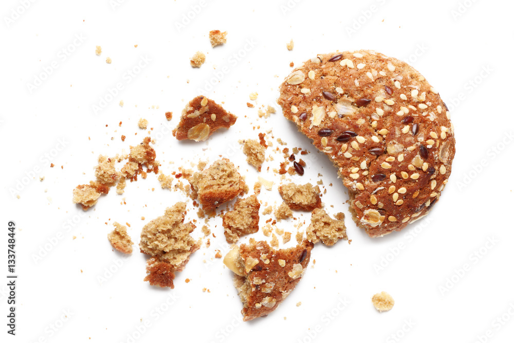 Cookies covered with nuts and raisins isolated on white background Cookies covered with nuts and raisins isolated on white background