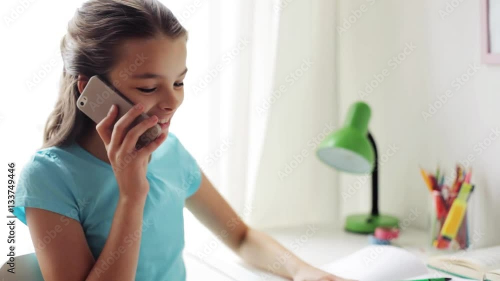 smiling girl calling on smartphone at home smiling girl calling on smartphone at home