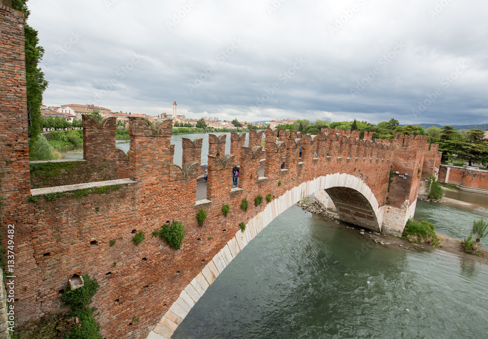 The Ponte Pietra (Stone Bridge), once known as the Pons Marmoreus, is a Roman arch bridge crossing the Adige River in Verona, Italy. The bridge was completed in 100 BC,