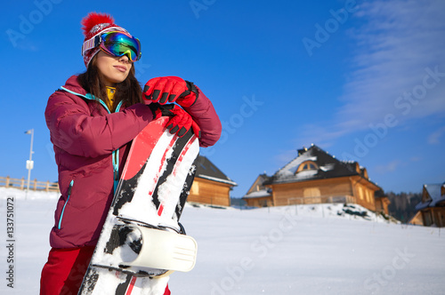 Winter, ski, snow and fun - snowboarder portrait - space for tex
