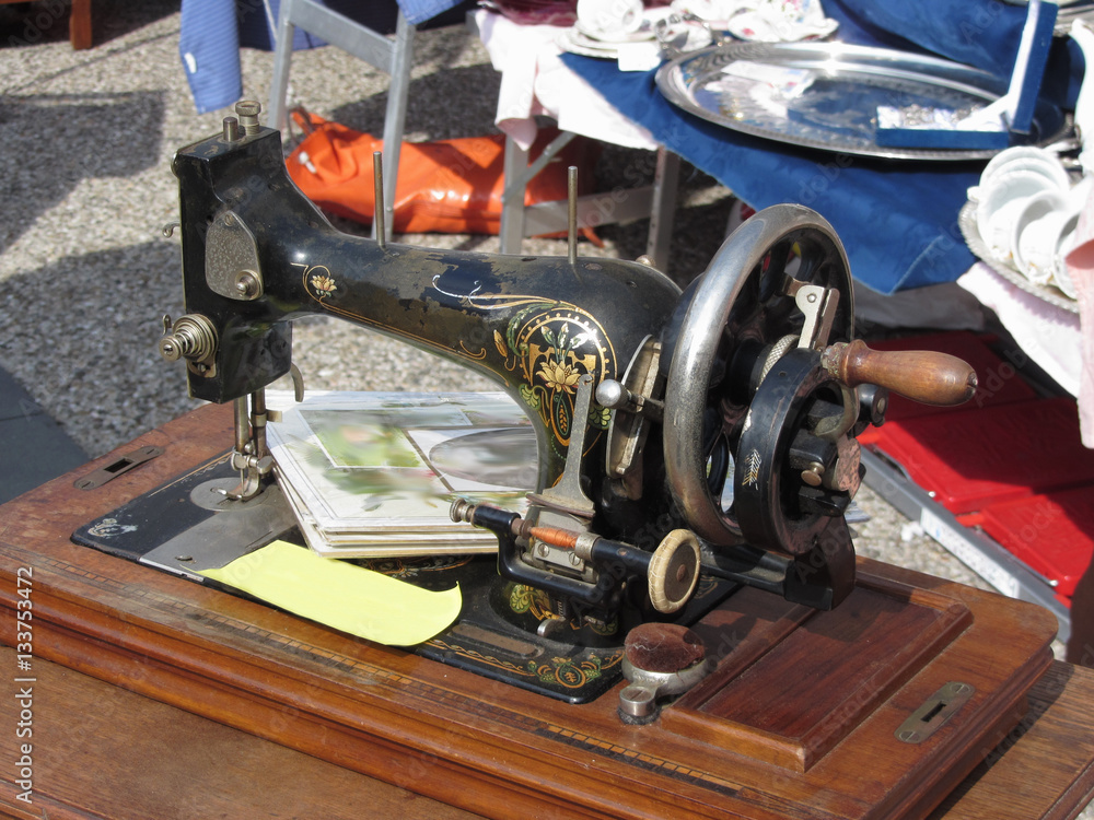 Fototapeta premium Vintage sewing machine at flea market . Tuscany, Italy
