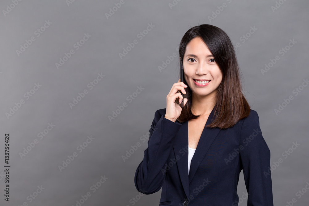 Businesswoman talk to cellphone Businesswoman talk to cellphone