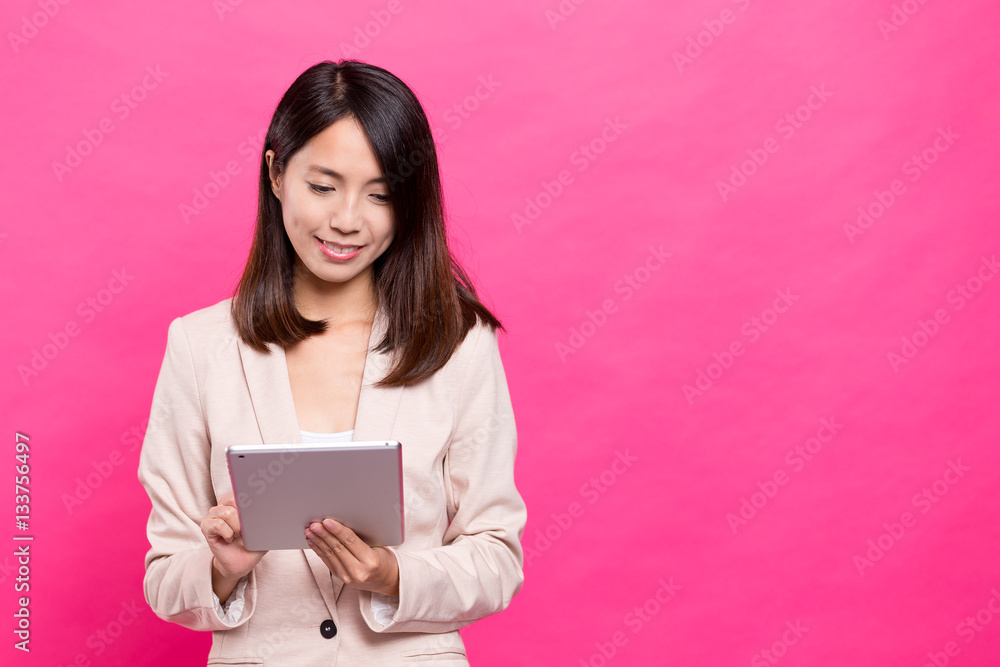 Businesswoman using digital tablet computer Businesswoman using digital tablet computer
