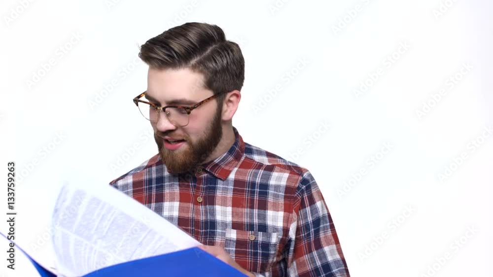 Happy casual businessman holding folder and satisfied with report Happy casual businessman holding folder and satisfied with report
