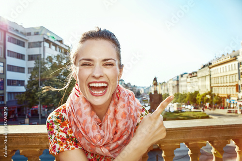 woman on Vaclavske namesti in Prague pointing on something