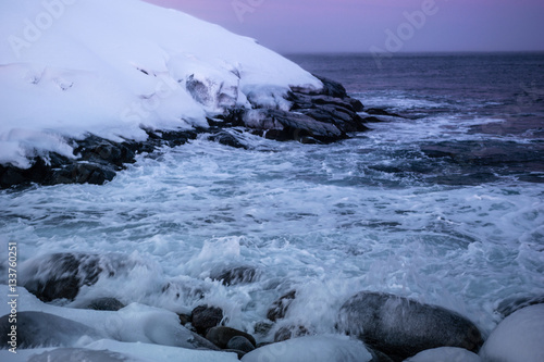 Snowy coast of Barents Sea in Teriberka, Murmansk Region, Russia