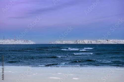 Snowy coast of Barents Sea in Teriberka  Murmansk Region  Russia