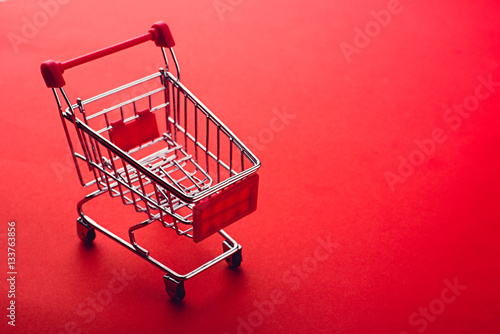 shopping cart on red backgrpund
