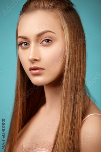 Beauty portrait of attractive girl with long hair