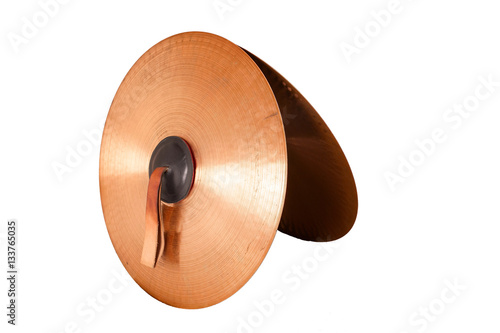 Close up of an prcussion cymbals with leather handle  isolated on background. photo