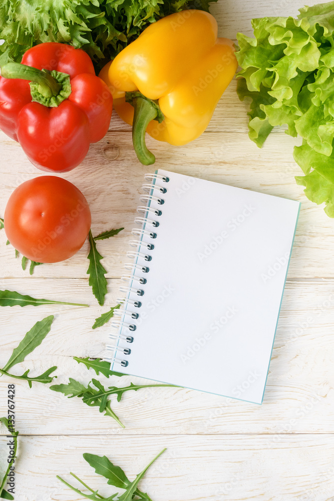 bell pepper, green salad and notepad bell pepper, green salad and notepad