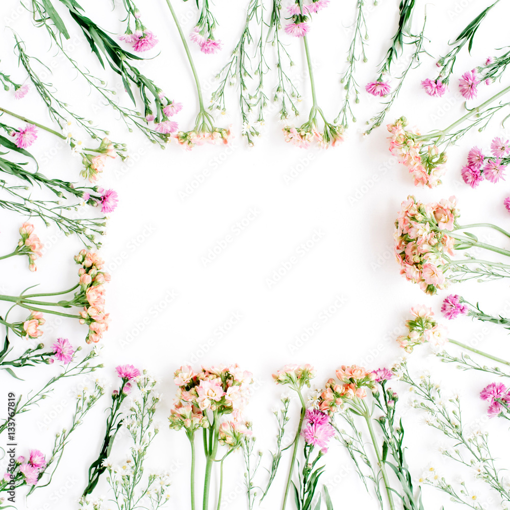 Square frame made of wildflowers. Flat lay, top view. Valentine's background