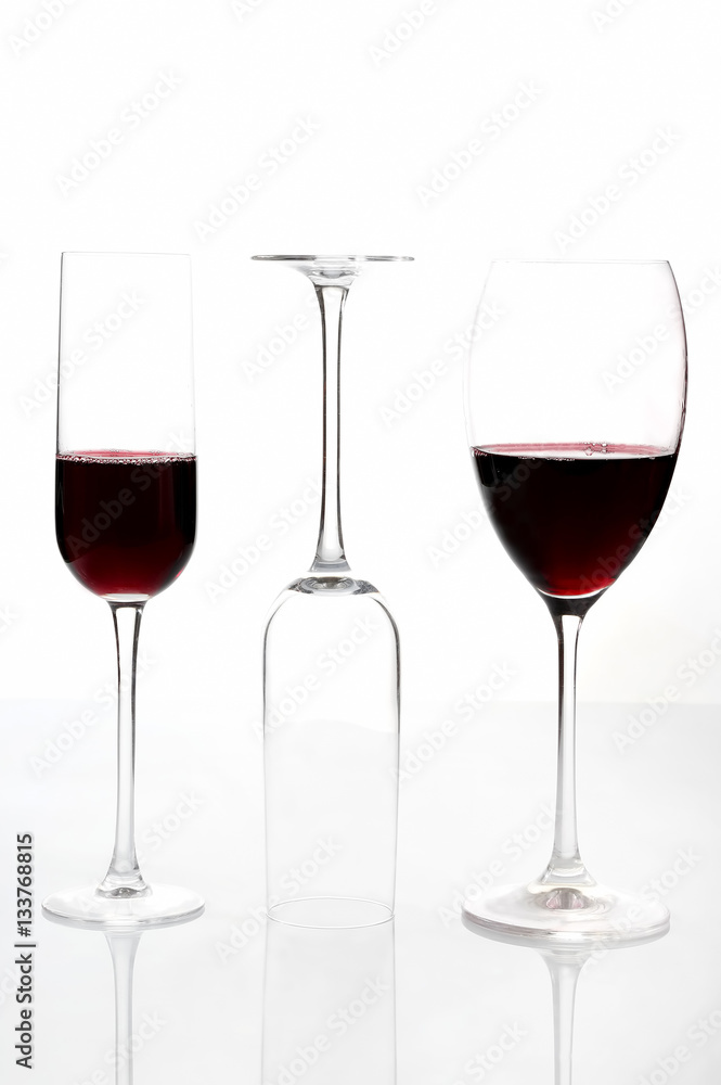 glasses with red wine on a light background glasses with red wine on a light background