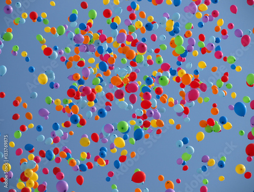 Multi colored balloons on a blue sky