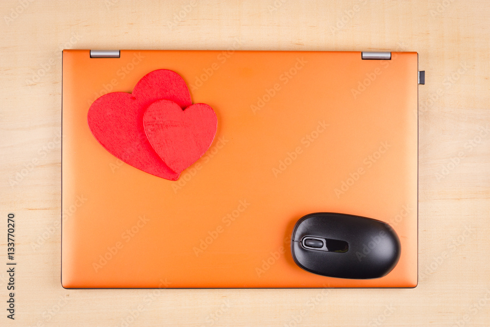 Card for Valentine's Day with two red hearts and PC portable and Card for Valentine's Day with two red hearts and PC portable and